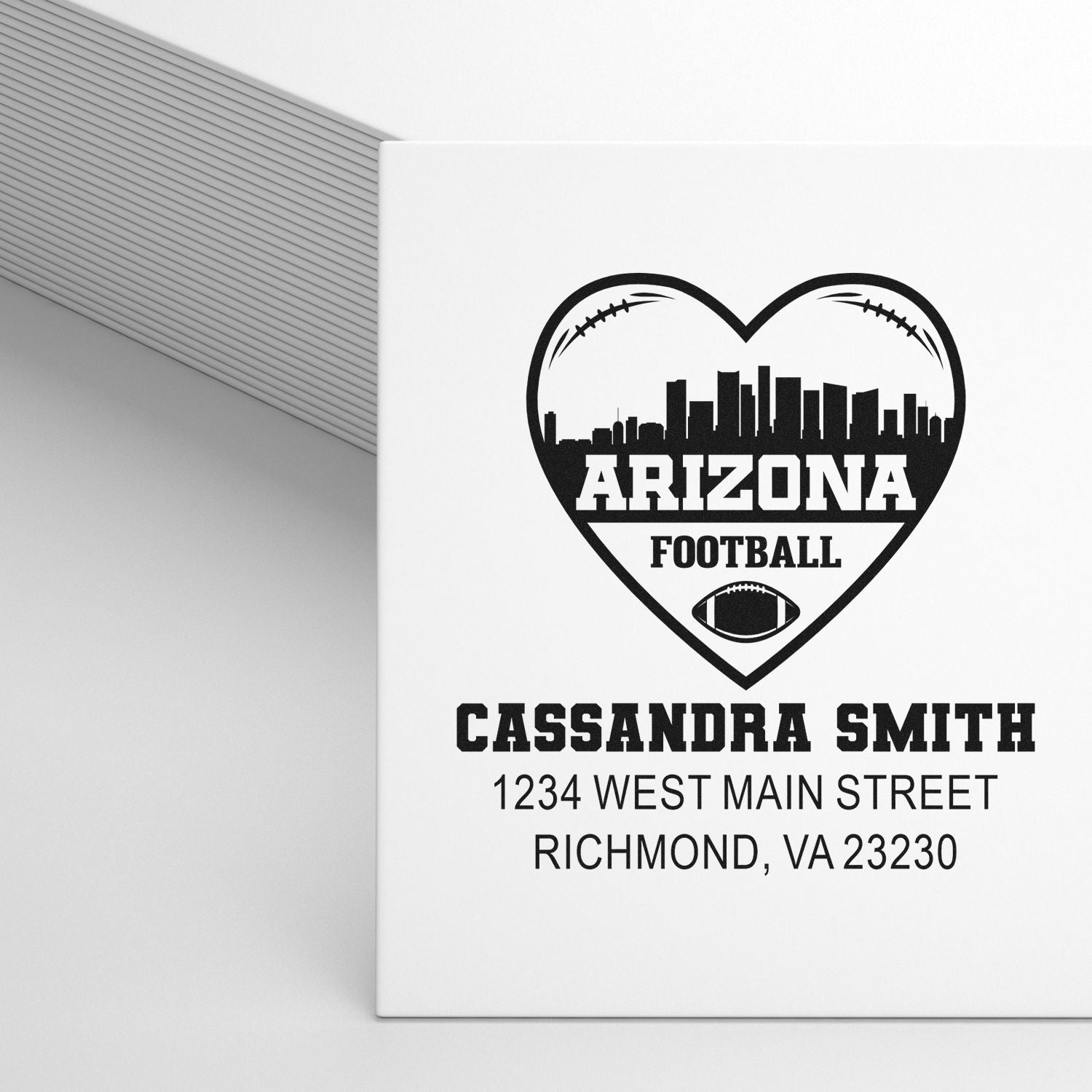 Personalized Arizona football rubber stamp with heart skyline logo, Cassandra Smith name, and return address in Richmond, VA.