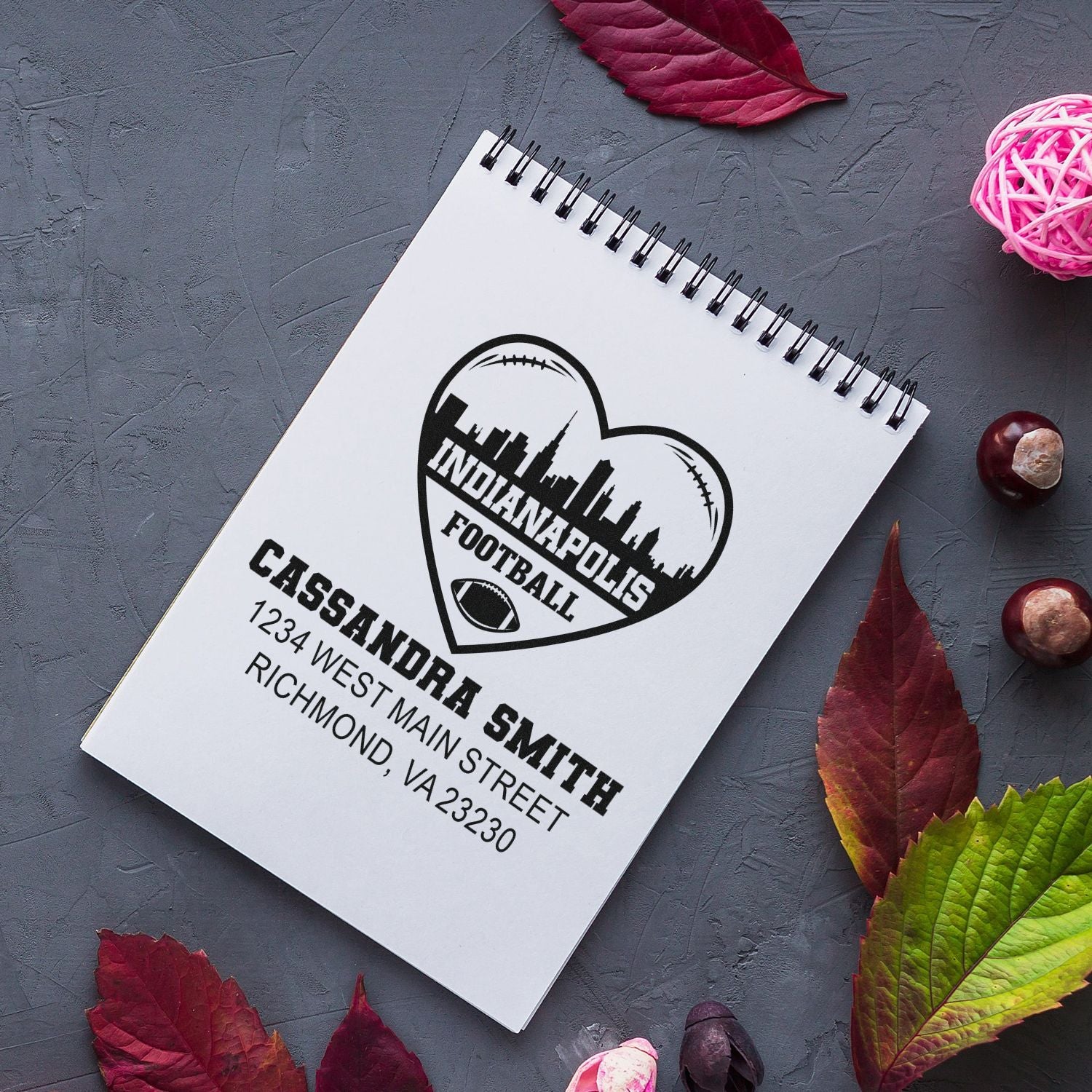 Personalized rubber stamp mockup for Indianapolis Football, featuring Cassandra Smith name and address.