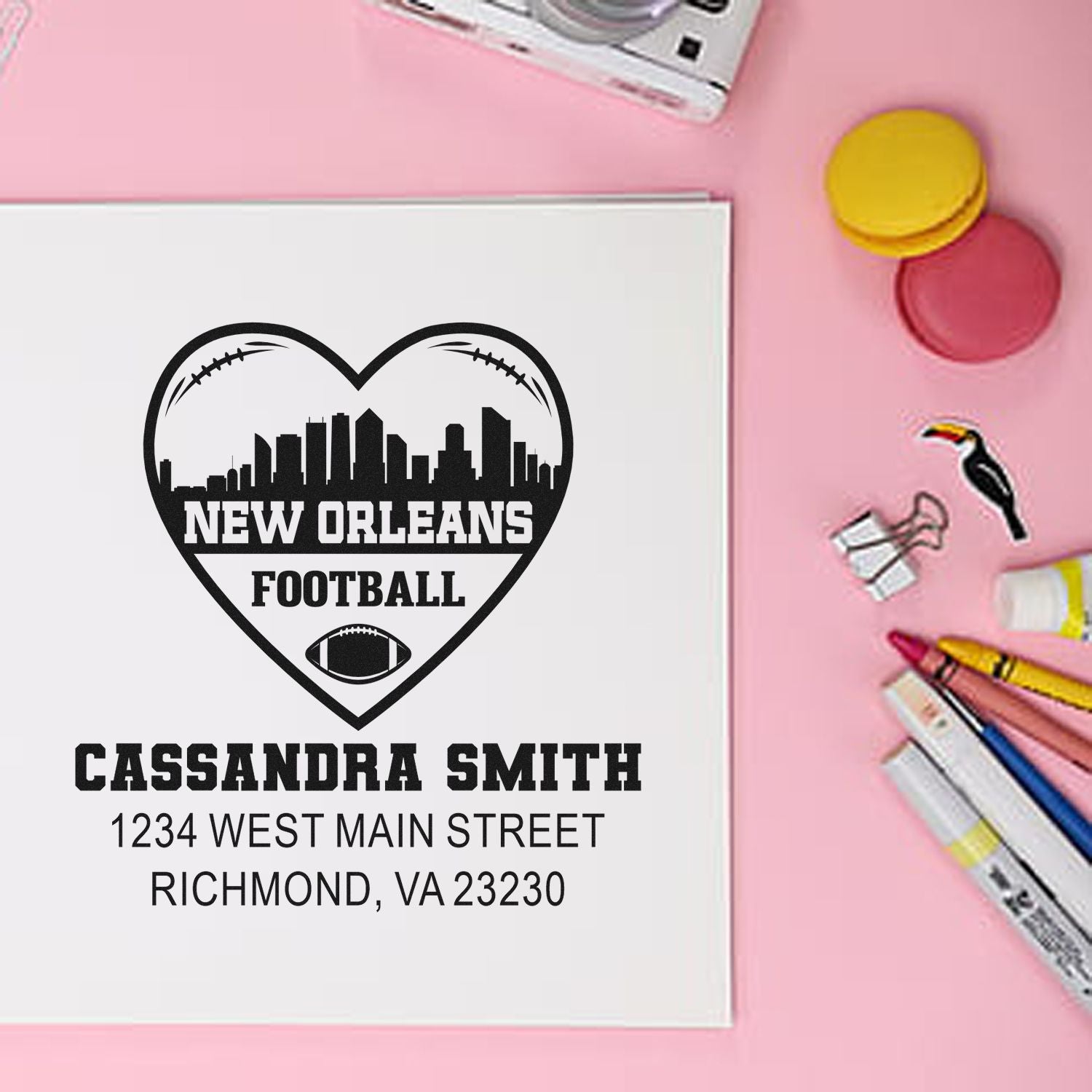 Personalized New Orleans football return address rubber stamp with heart skyline, name, and address for stationery.