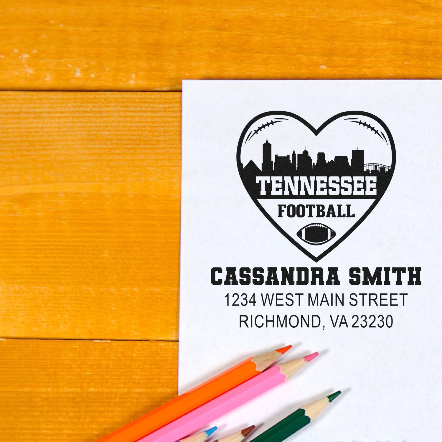 Custom Tennessee football return address stamp design with heart skyline, name, and mailing address.