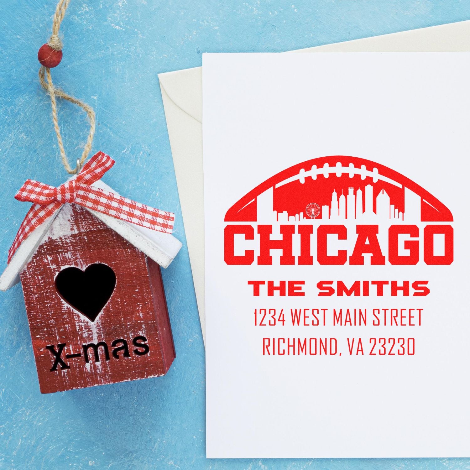 Custom rubber stamp holiday card with Chicago skyline, The Smiths address, and handmade X-mas house ornament.