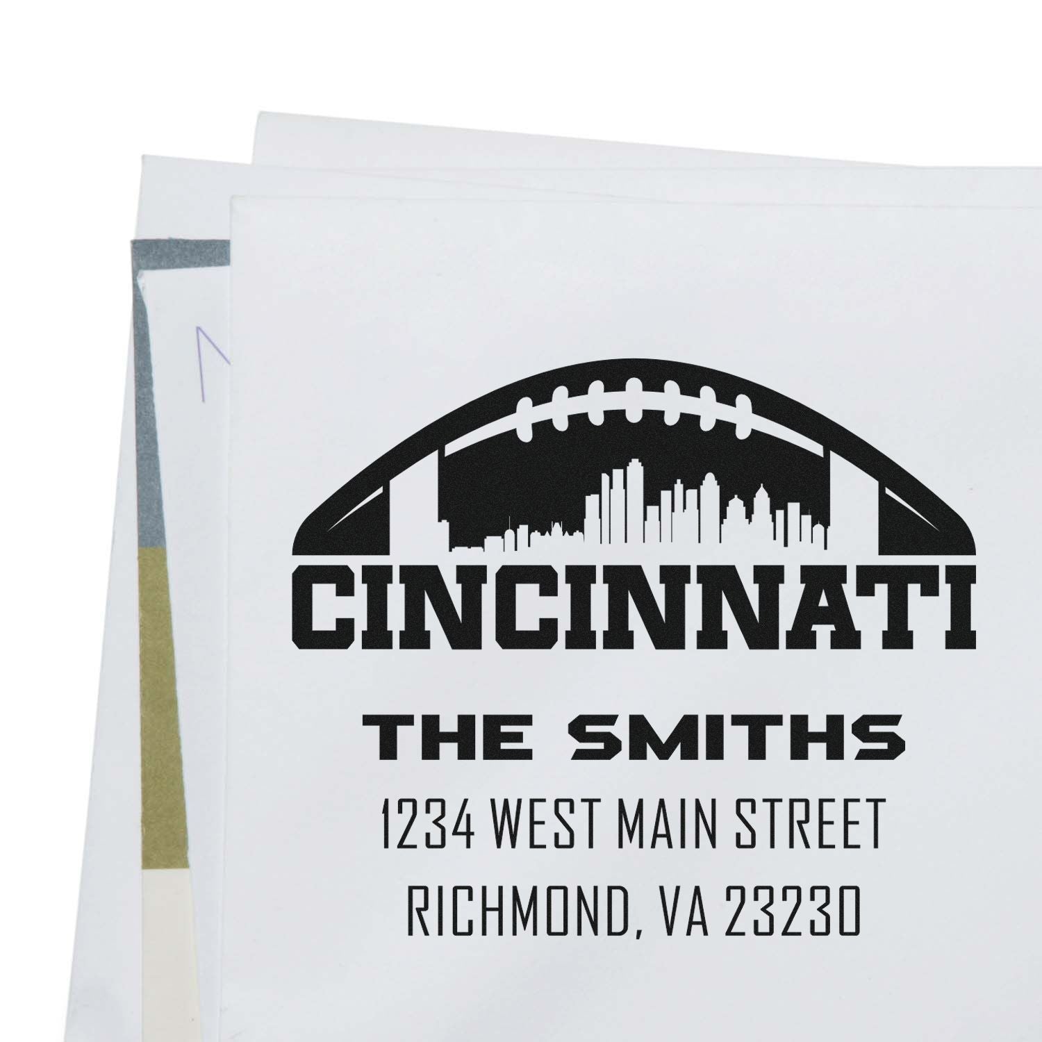 Custom return address rubber stamp with Cincinnati football skyline for The Smiths, Richmond, VA 23230.