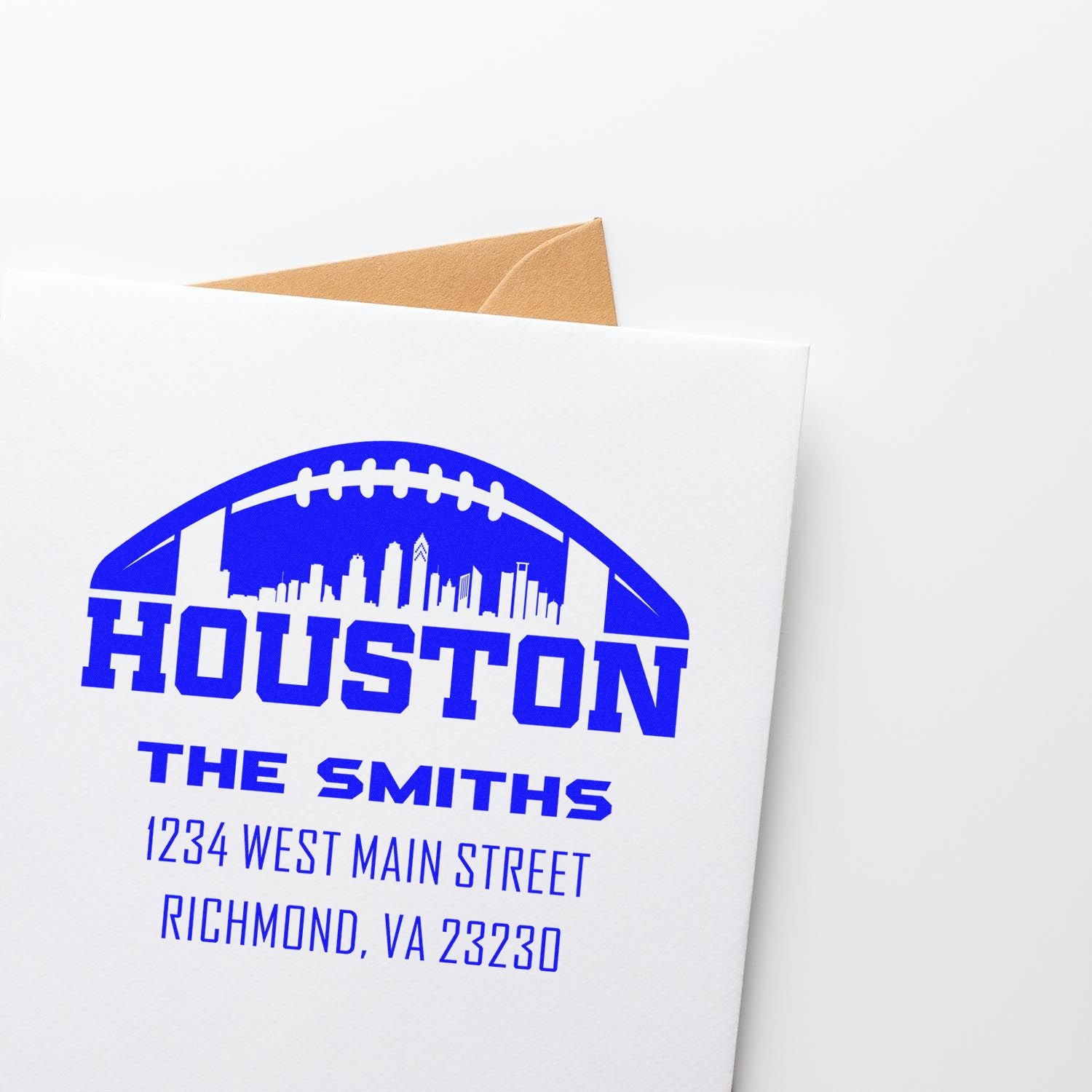 Custom Houston football return address rubber stamp for The Smiths, with skyline design and mailing address on an envelope.