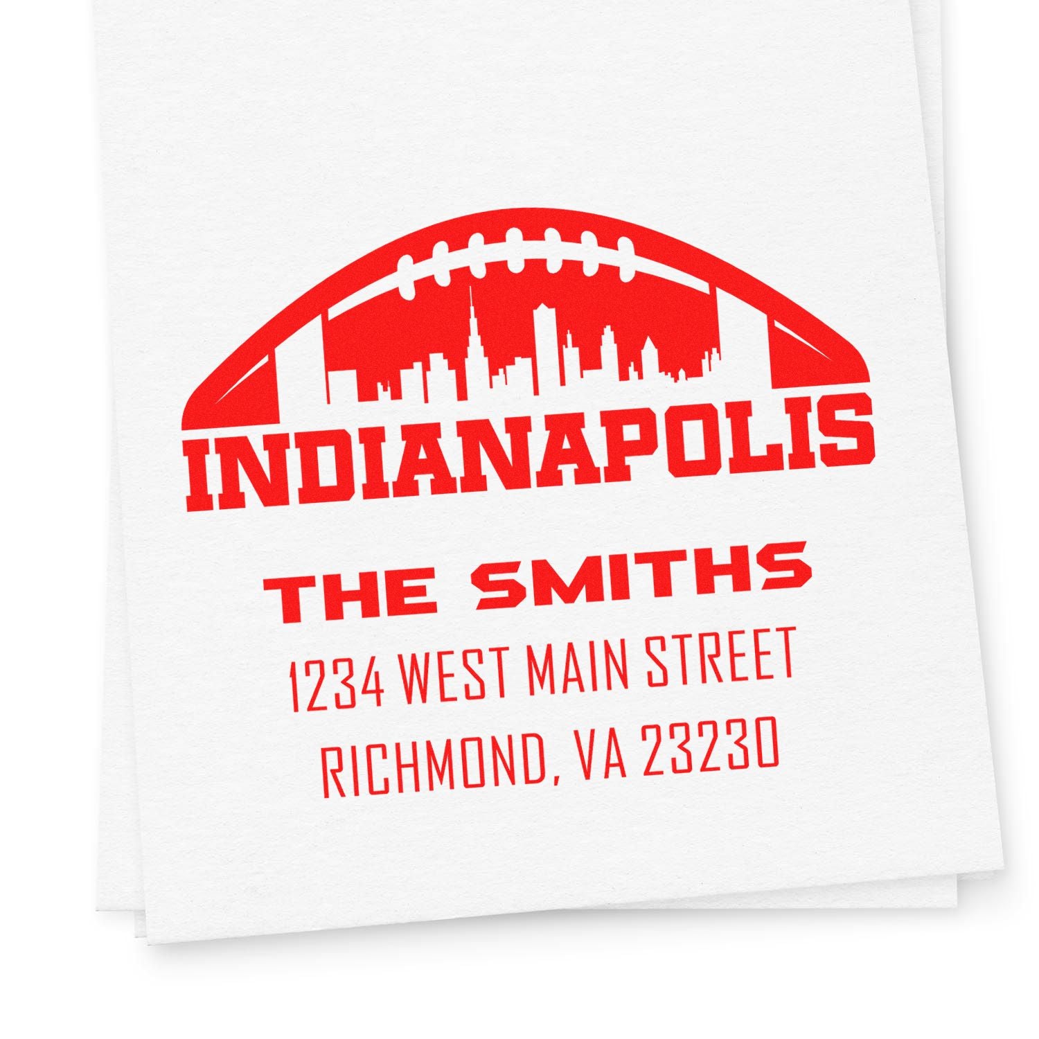 Custom Indianapolis address rubber stamp with football skyline, family name, and return mailing details.