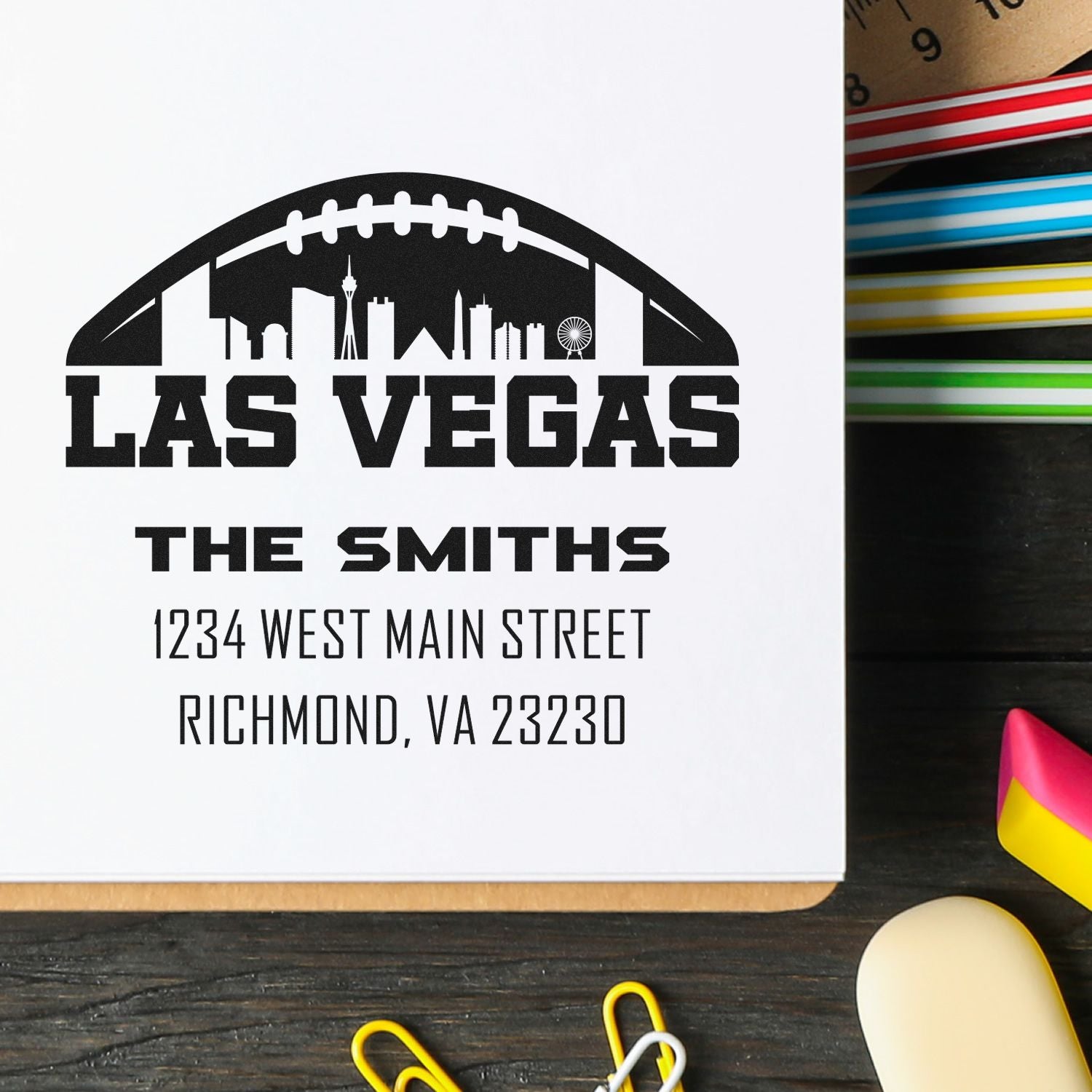 Custom Las Vegas address rubber stamp with football skyline for The Smiths, 1234 West Main Street, Richmond, VA 23230.