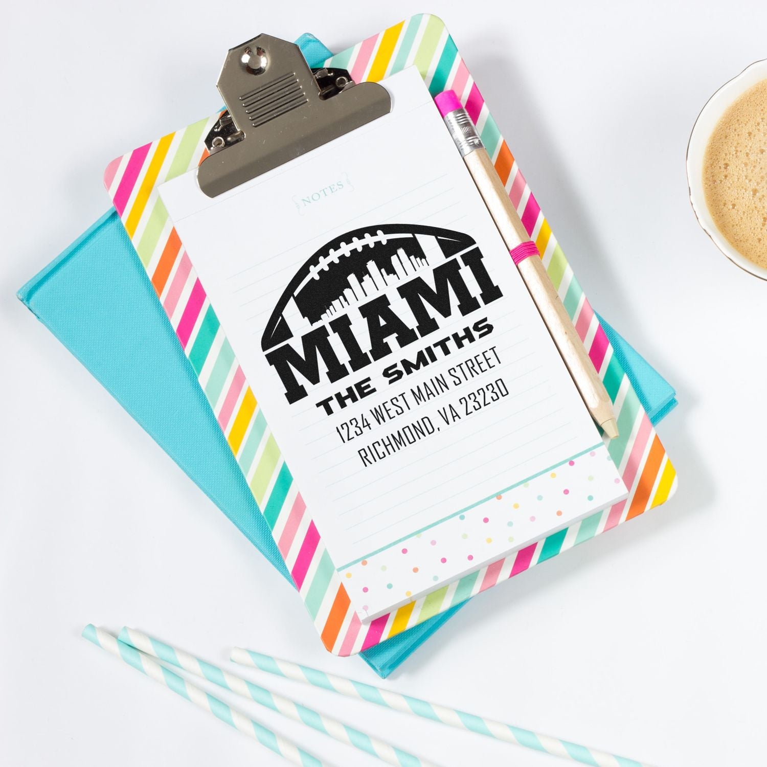 Football-themed custom address rubber stamp imprint on notepad, featuring the Smith family name and Miami home address.