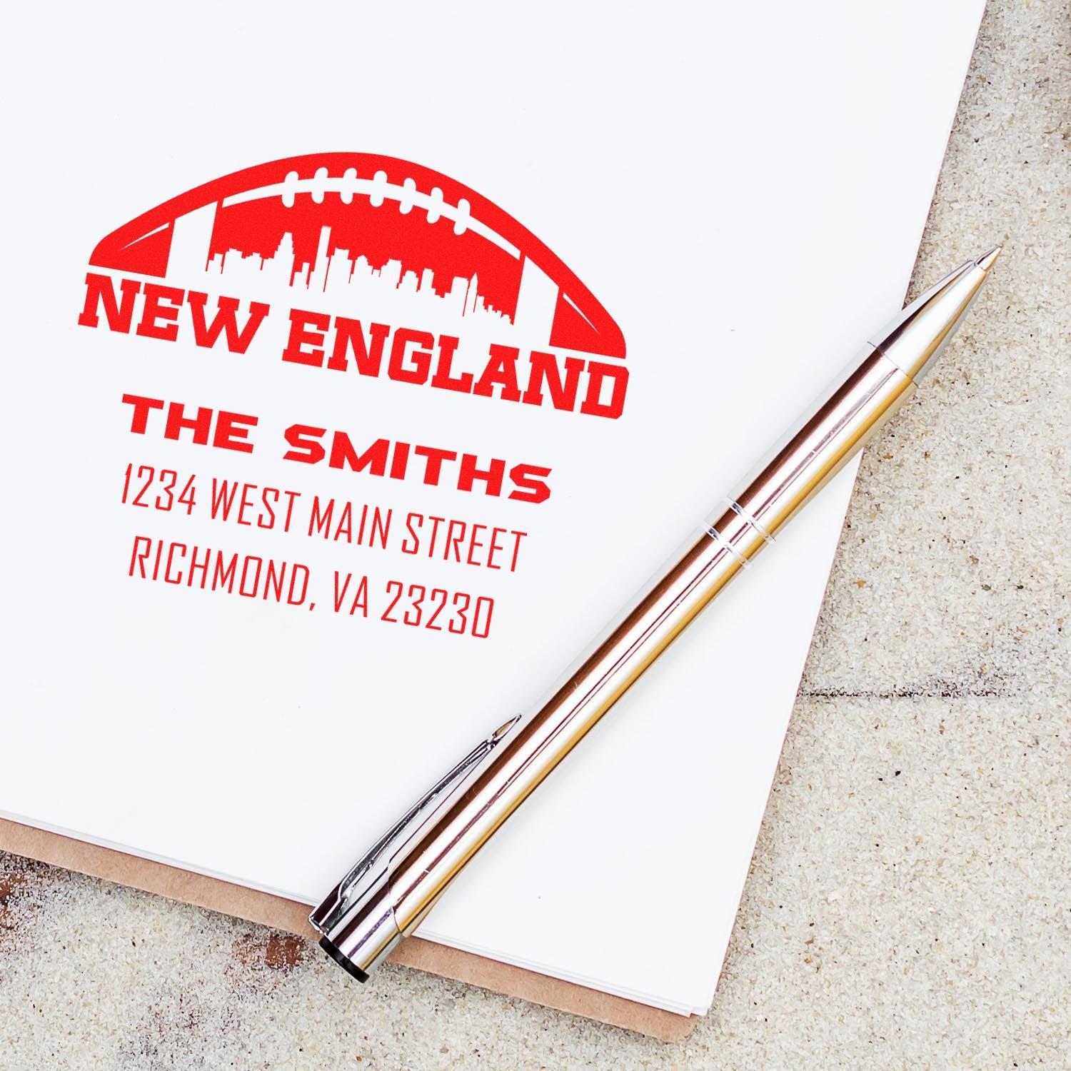 Custom New England football address rubber stamp for personalized stationery, team gifts, and business branding.