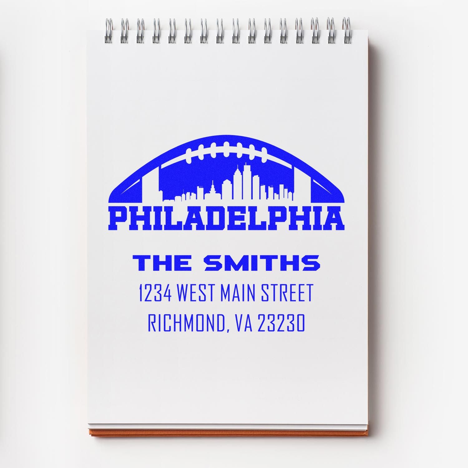 Custom rubber address stamp with Philadelphia football skyline logo, The Smiths, and Richmond, VA 23230