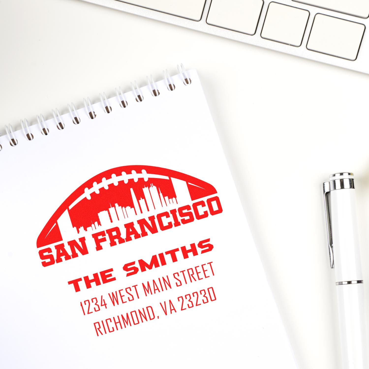 Personalized address rubber stamp with San Francisco football logo for The Smiths, ideal for business branding and mailing.