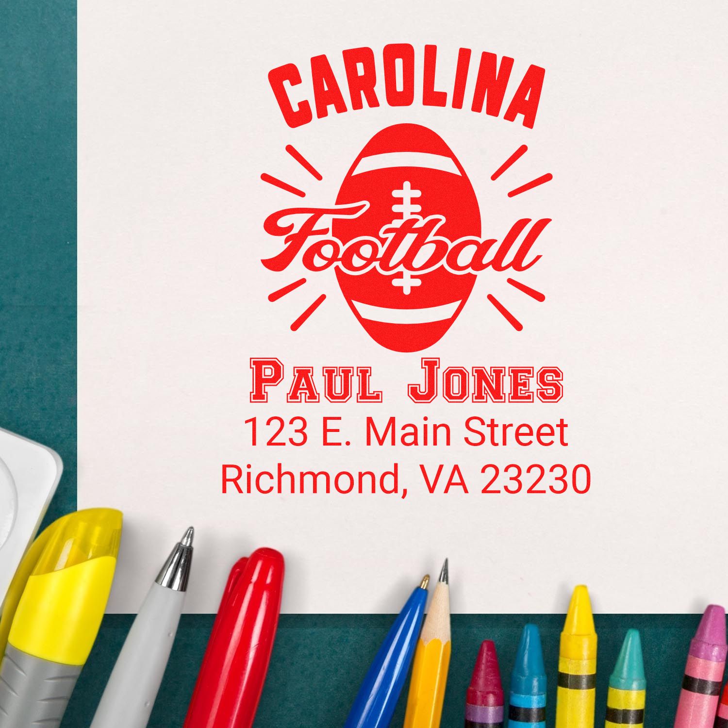 Custom Carolina football rubber stamp with personalized name and return address for sports-themed mail and branding.