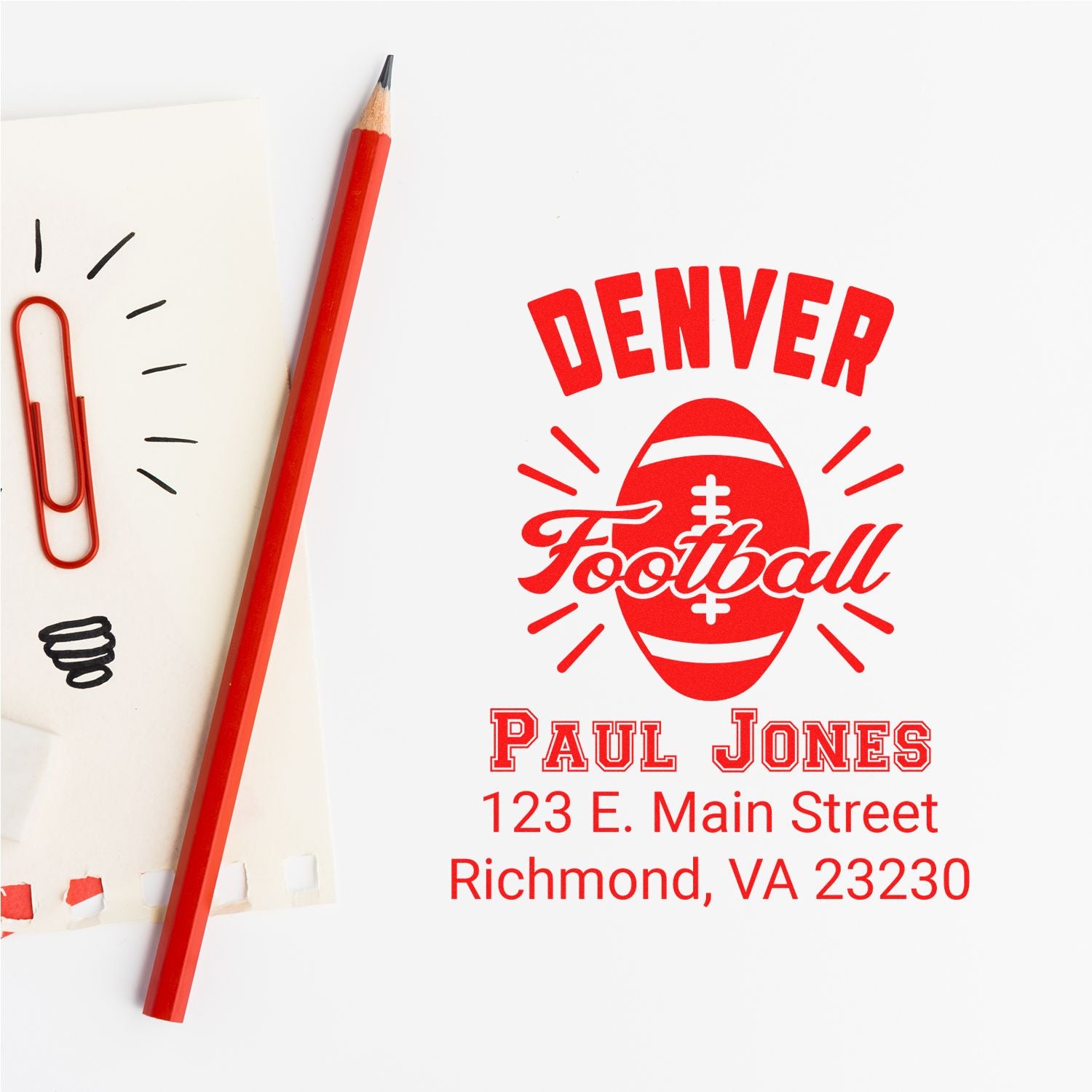 Custom football rubber stamp with name, address, and sports logo for personalized return address stamping.
