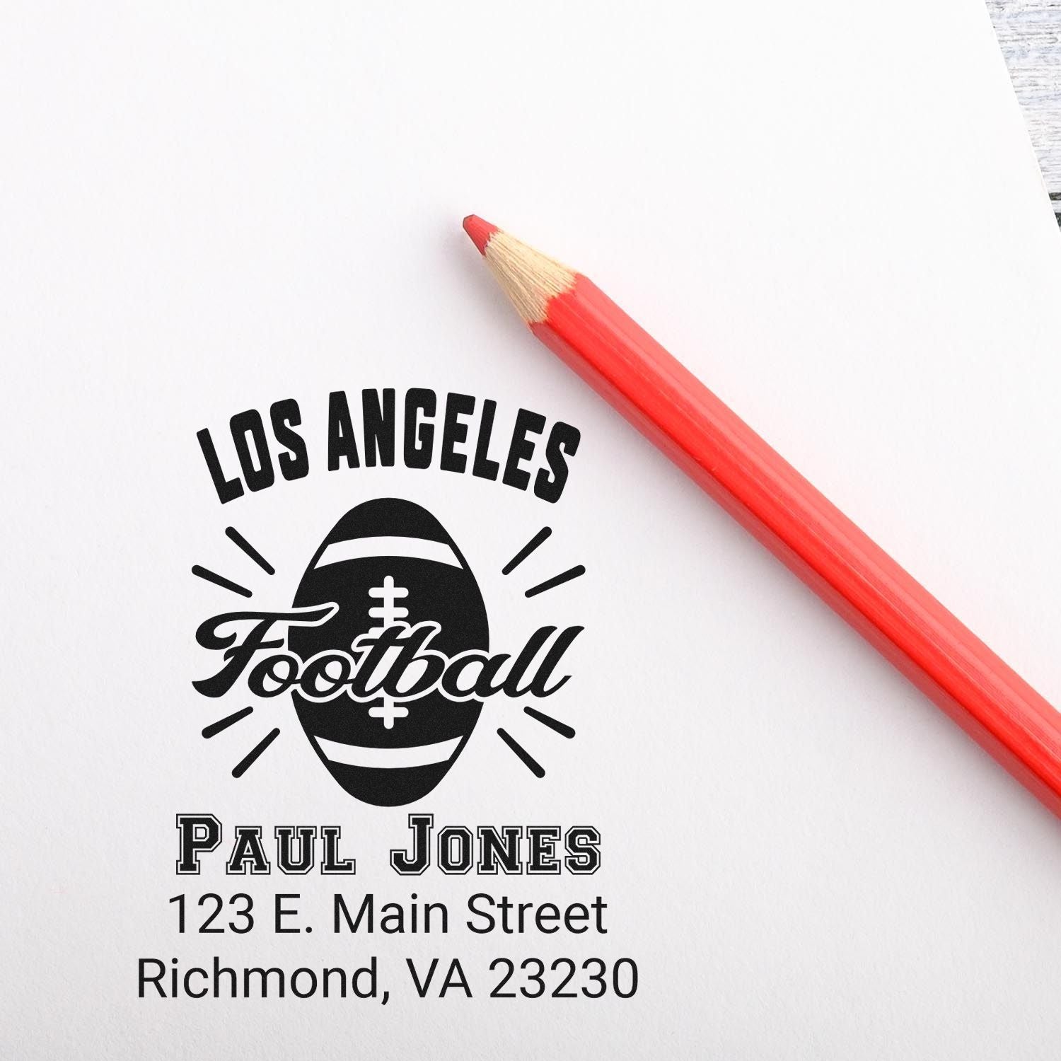 Custom Los Angeles football rubber stamp with Paul Jones name and Richmond, VA return address for sports-themed mailings.