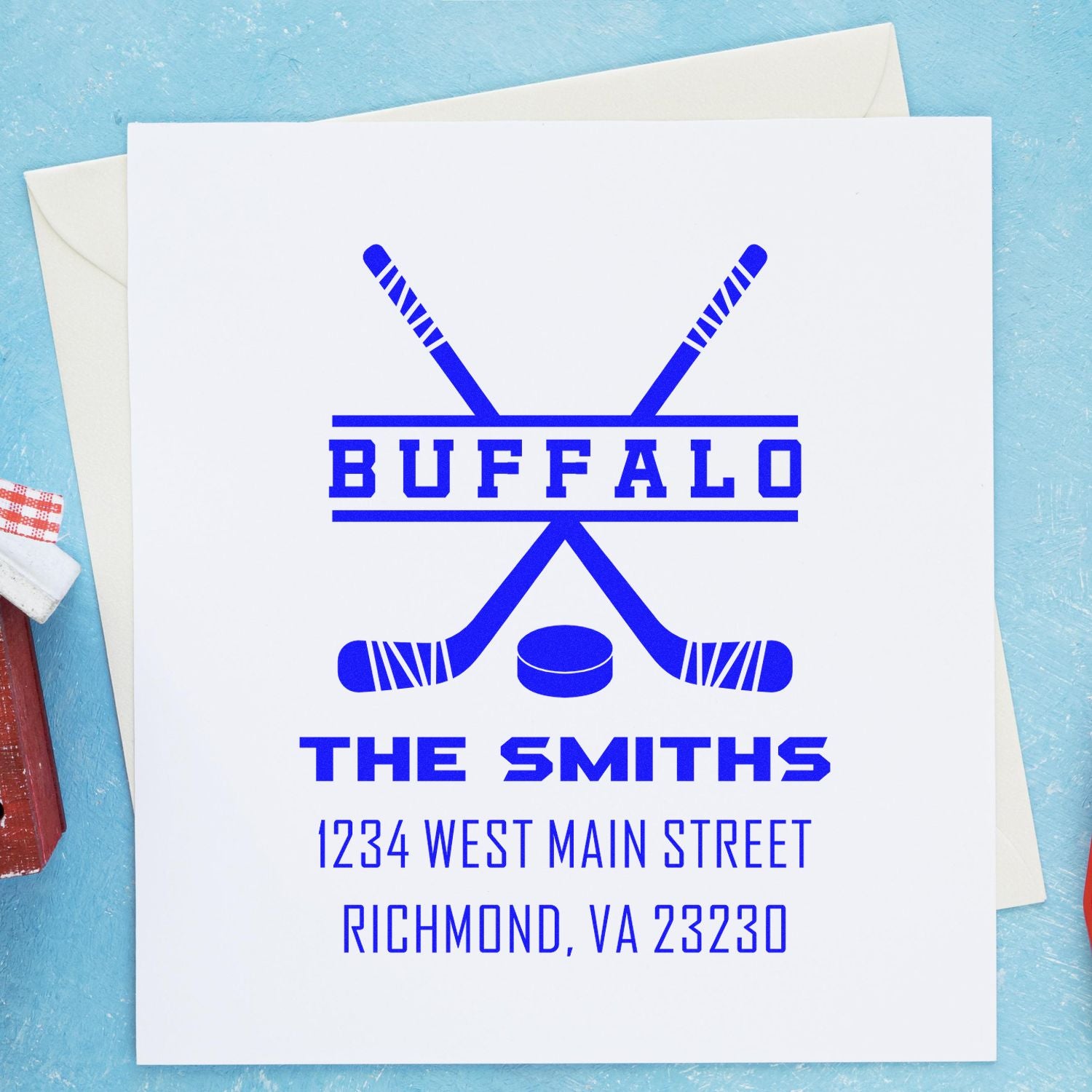 Custom Buffalo hockey return address rubber stamp for The Smiths, featuring crossed sticks, puck, and address.