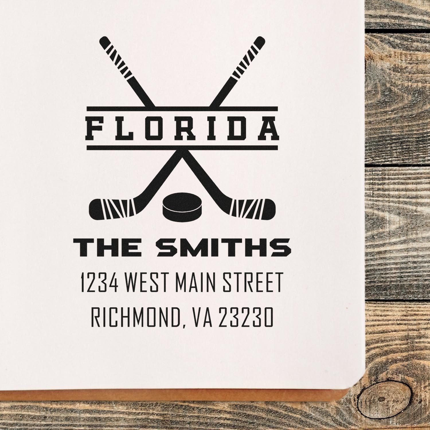 Custom hockey address rubber stamp for The Smiths, Florida, with crossed sticks and personalized return address.