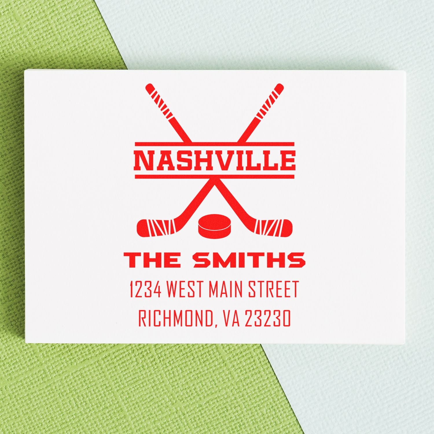 Custom personalized rubber stamp with hockey logo, The Smiths name, and return address.