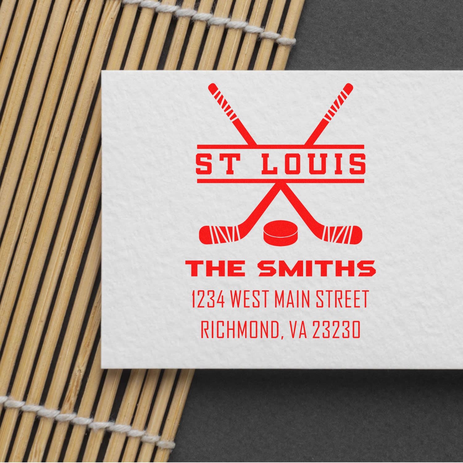 Custom hockey return address rubber stamp for The Smiths, featuring St. Louis, MO address and team-style crossed sticks logo.