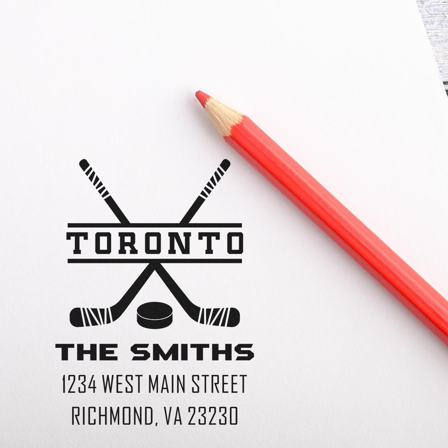 Custom hockey return address rubber stamp with Toronto logo, The Smiths name, and address for mailings.