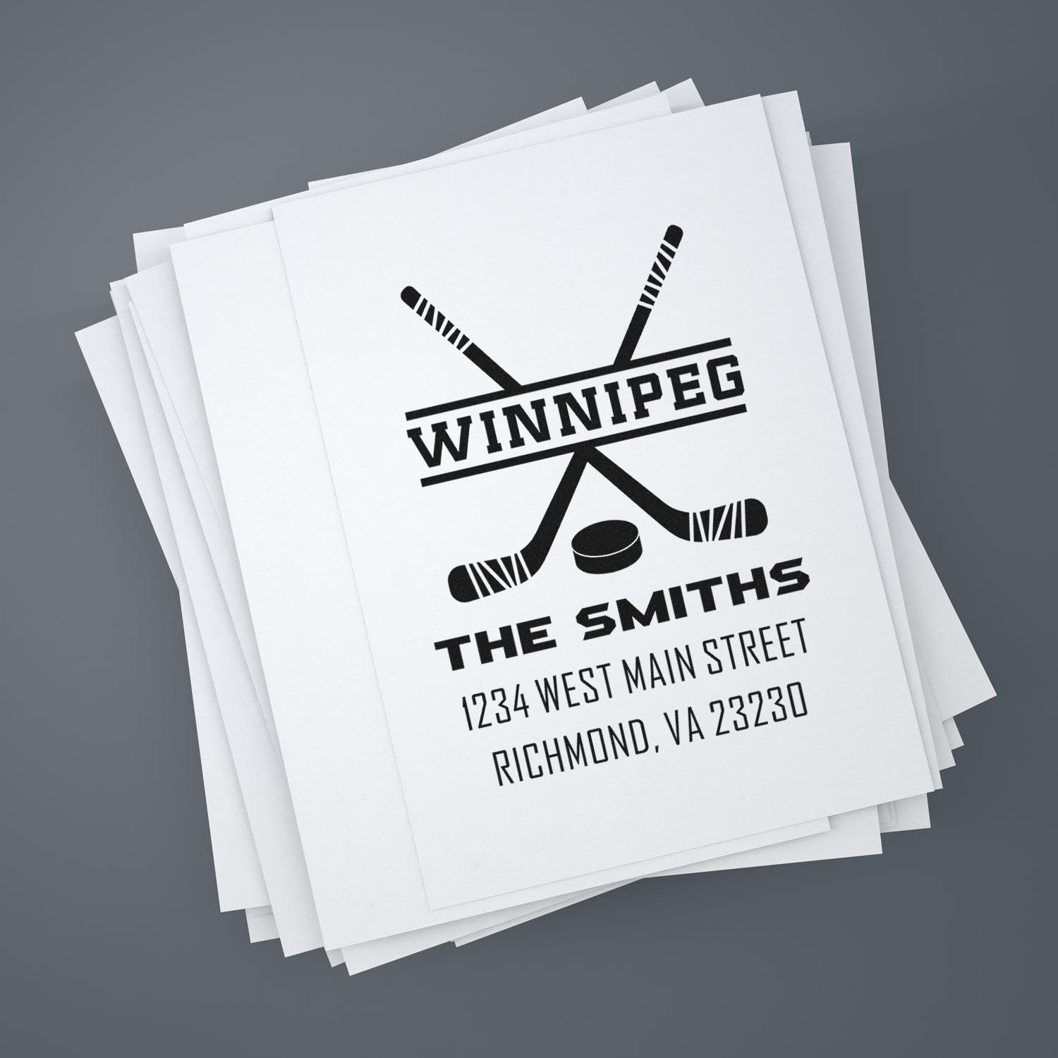 Custom hockey return address rubber stamp impression for The Smiths with Winnipeg logo and address.
