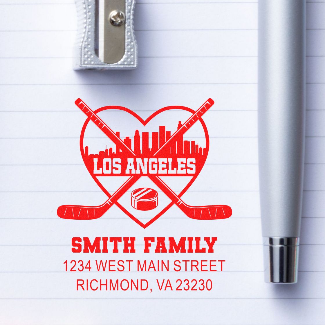 Custom rubber address stamp with Los Angeles hockey heart logo and Smith Family return address, Richmond, VA.
