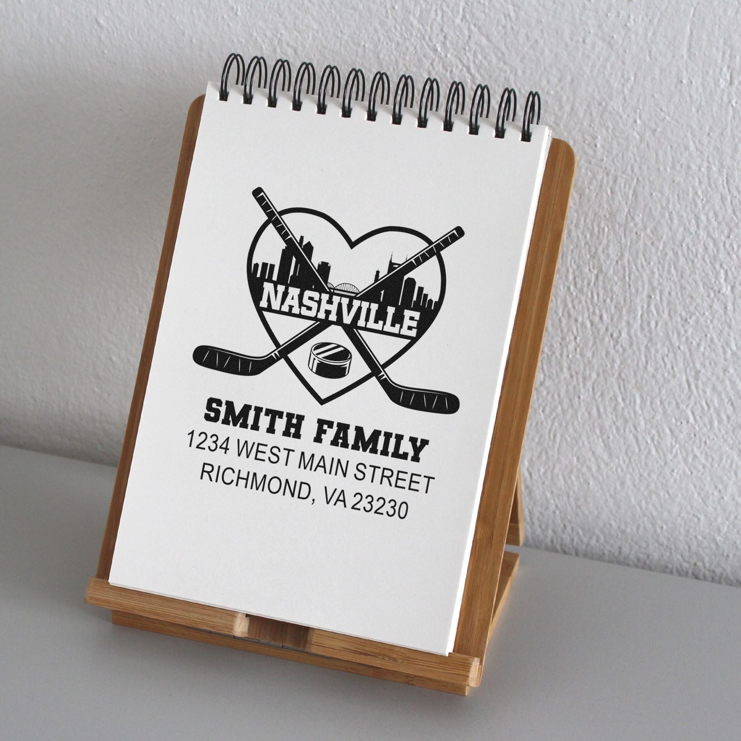 Custom Nashville hockey rubber stamp with family name and address for personalized return address mailing.