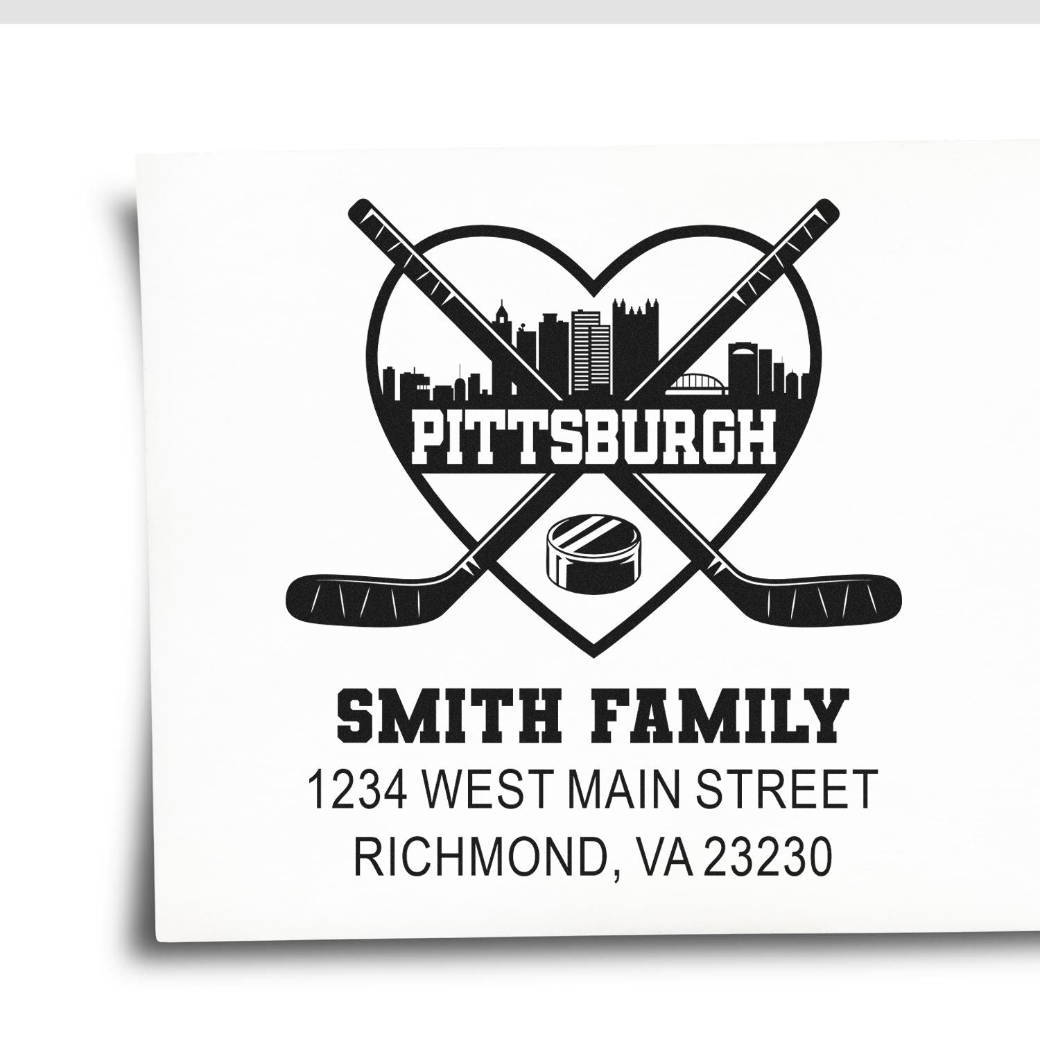 Custom Pittsburgh hockey rubber stamp with skyline, crossed sticks, and family address for personalized return mail.