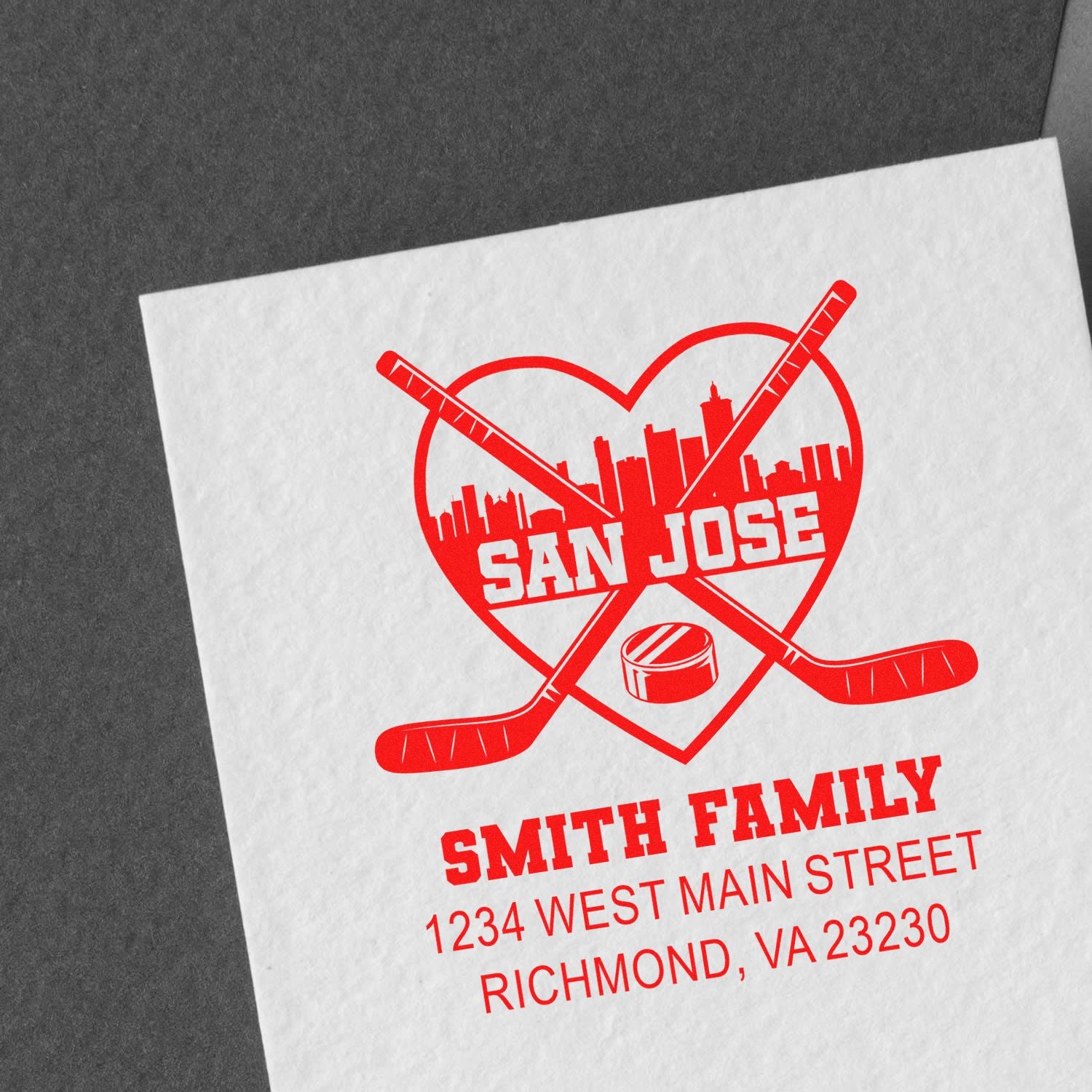 Custom San Jose hockey rubber stamp with family name and address for personalized return mail and gifts.