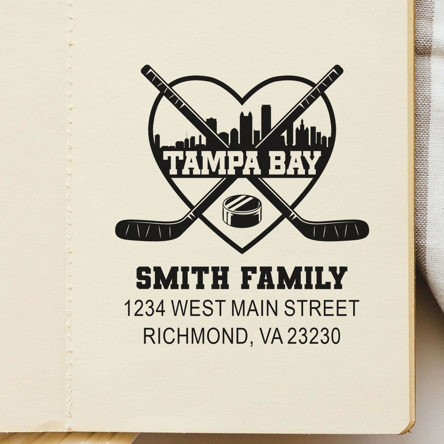 Custom hockey return address rubber stamp for Smith Family, Tampa Bay skyline design with crossed sticks.