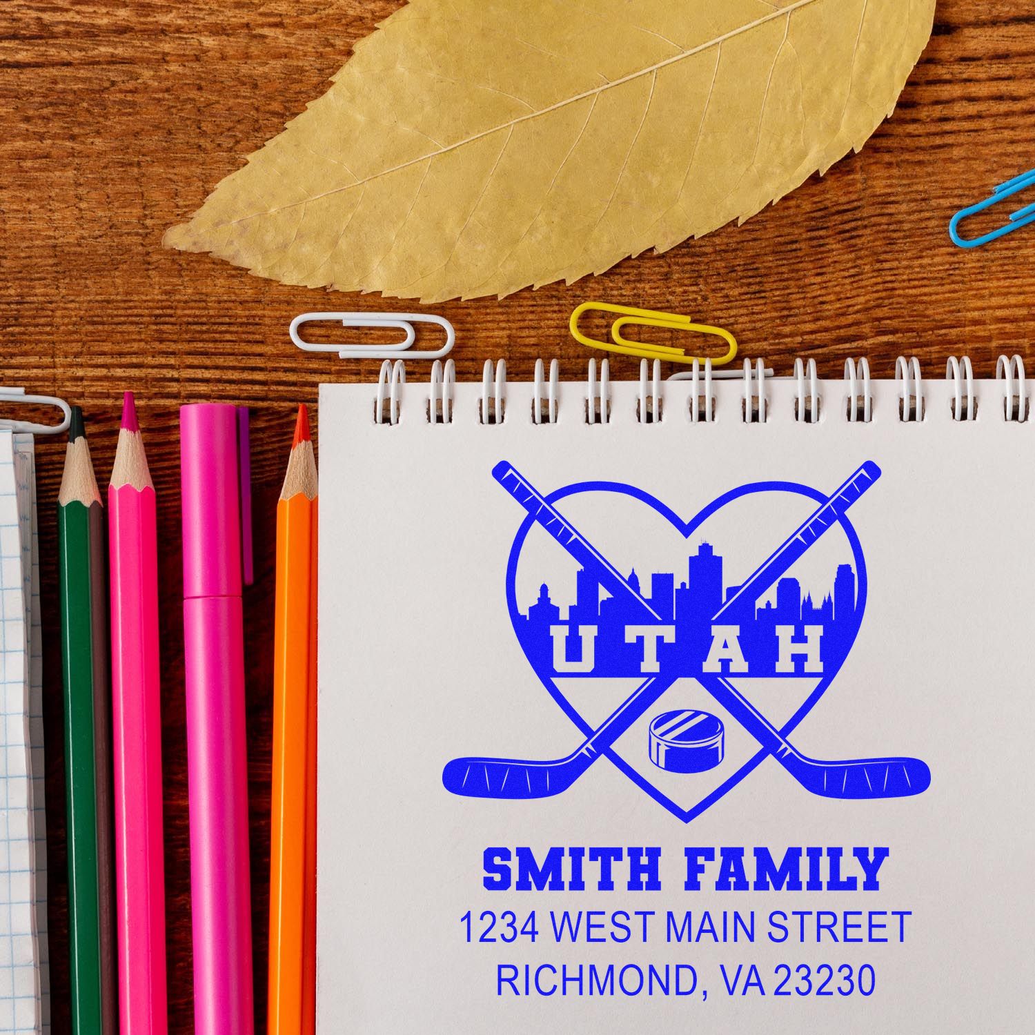 Personalized hockey family return address rubber stamp with skyline design for envelopes, stationery, and gift ideas.
