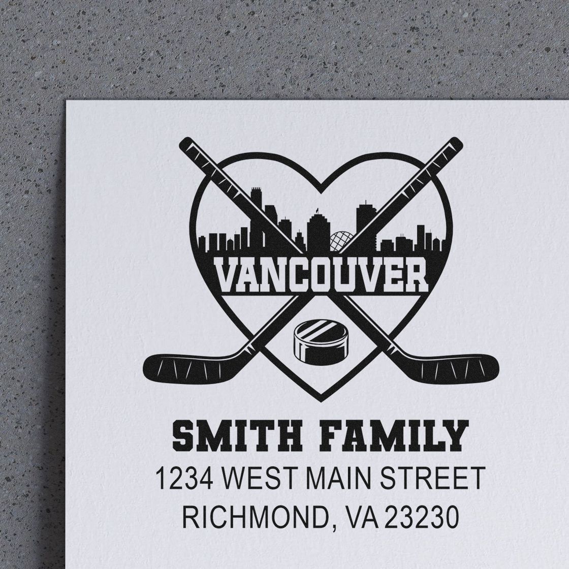 Custom Vancouver hockey family rubber stamp design with skyline, crossed sticks, and Smith Family return address