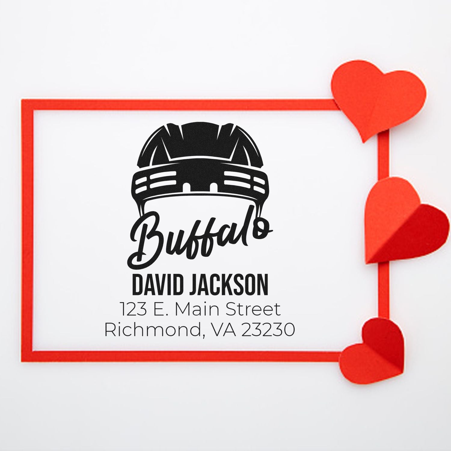 Custom Buffalo rubber address stamp with firefighter helmet logo, name and mailing address for personalized correspondence.