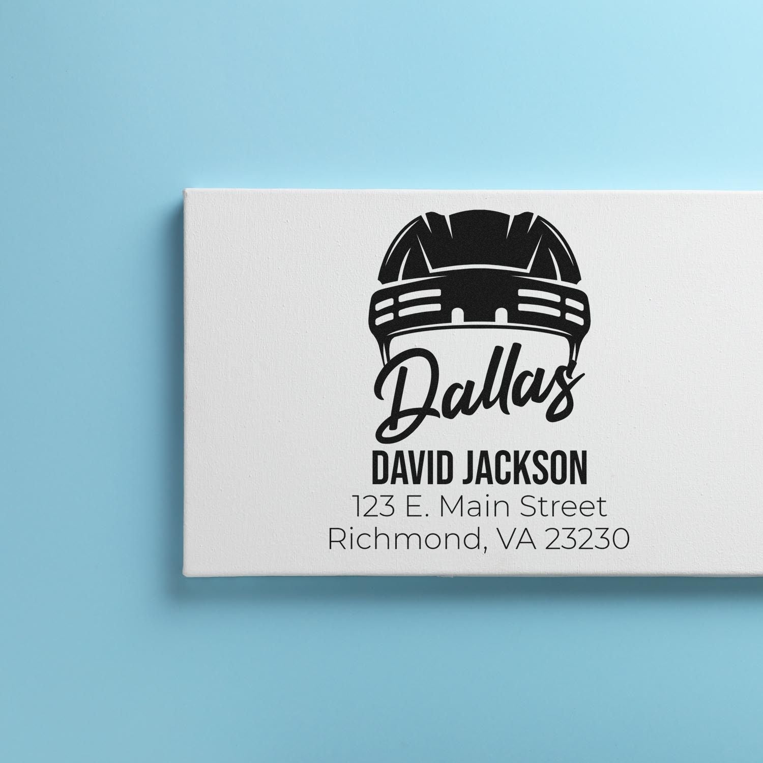Custom return address rubber stamp with football helmet logo, Dallas name, and Richmond VA 23230.