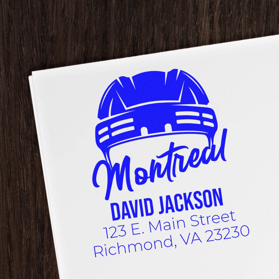 Custom personalized rubber stamp impression with construction hard hat logo, David Jackson name, and Richmond, VA address in blue.