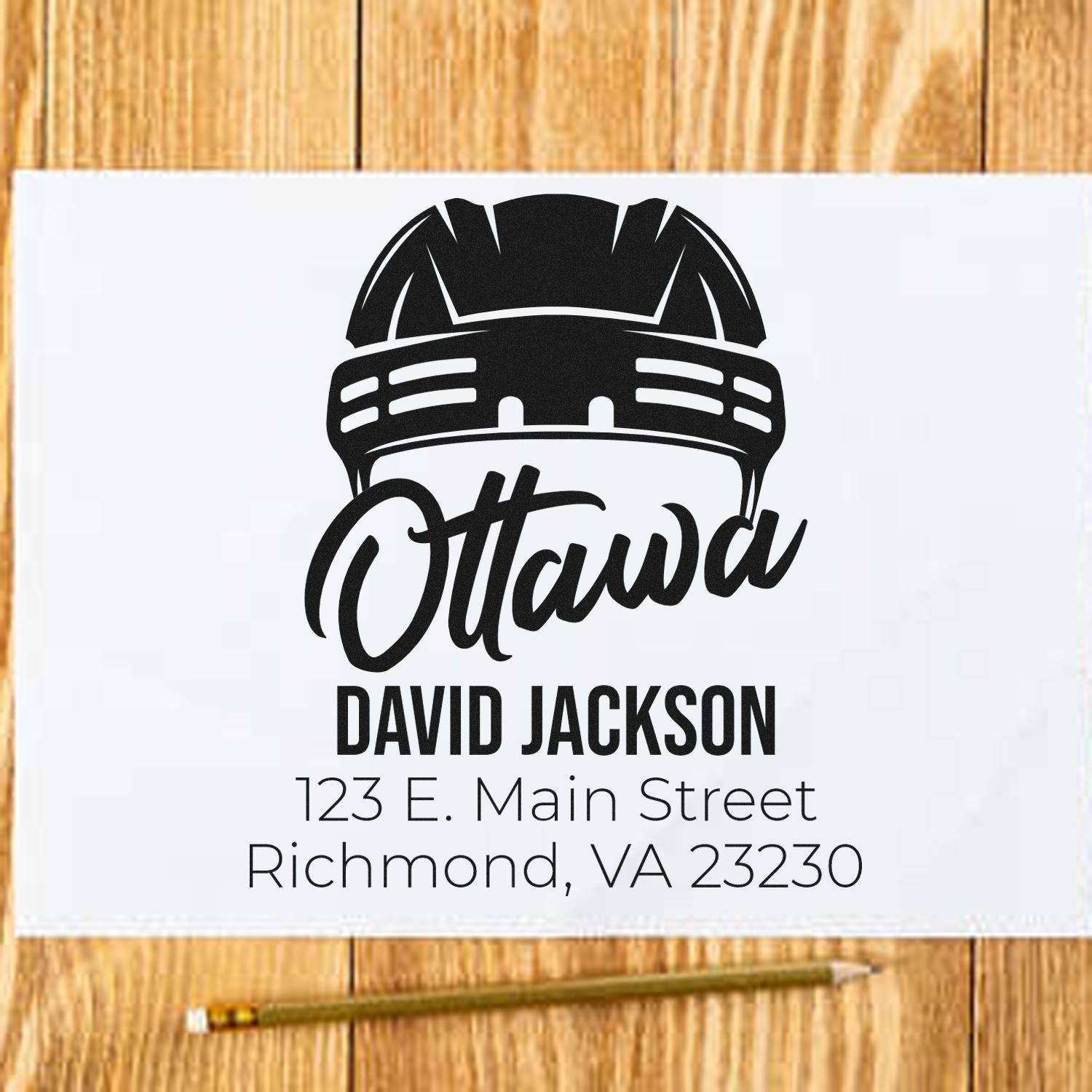 Custom construction hard hat return address rubber stamp for David Jackson, 123 E. Main St., Richmond, VA.