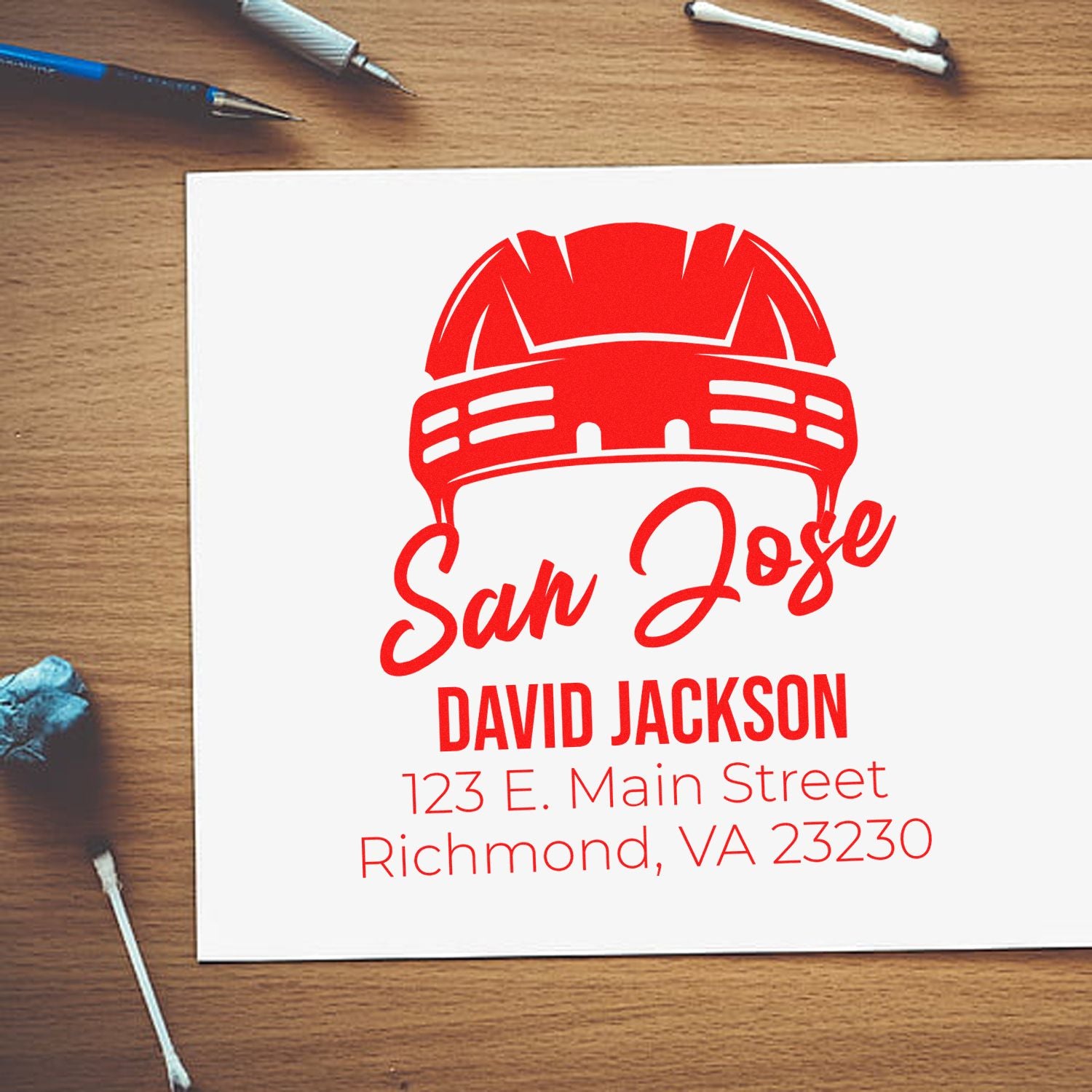 Custom construction address rubber stamp with hard hat logo, David Jackson name, and Richmond, VA mailing details.