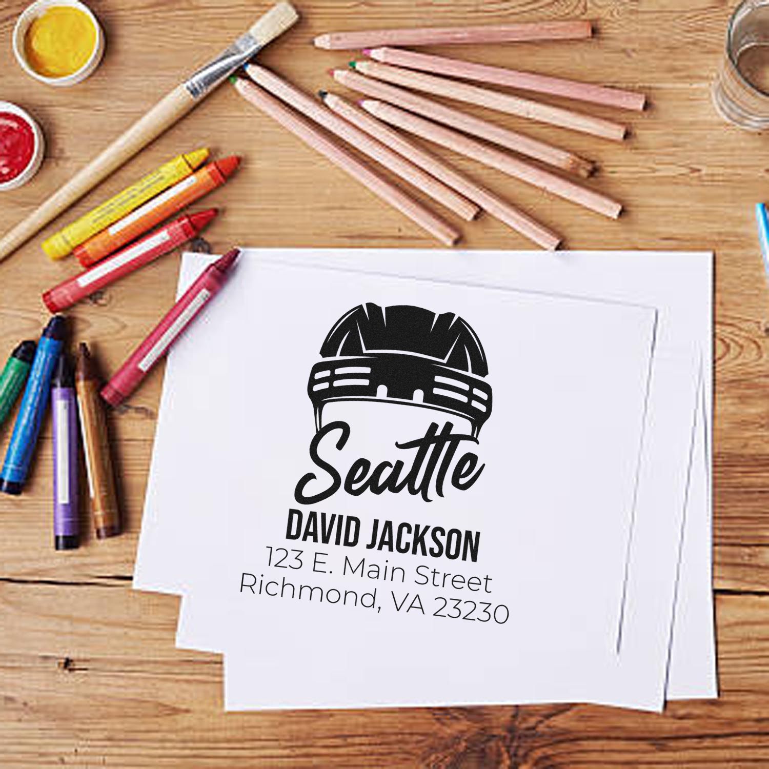 Custom Seattle address rubber stamp design for David Jackson, featuring name and mailing address for personalized branding.