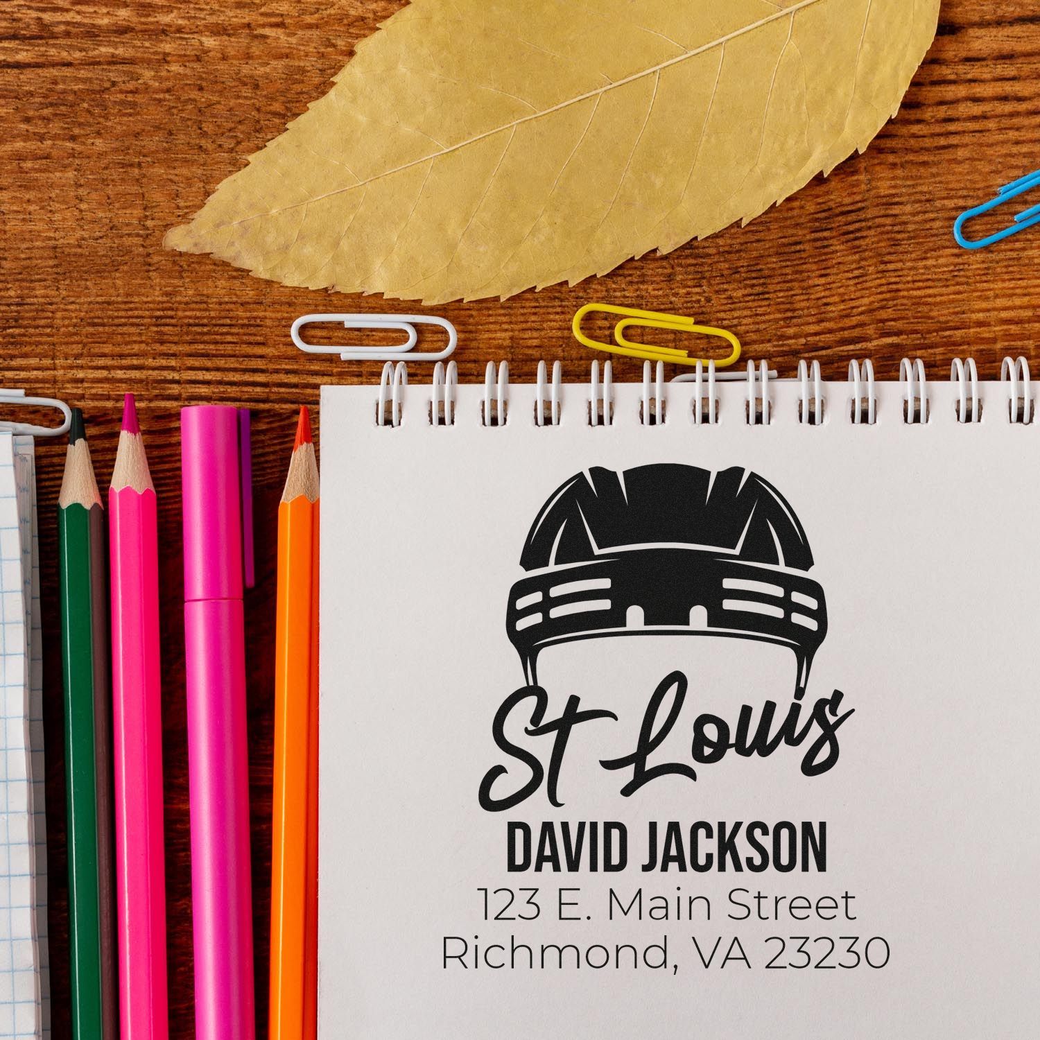 Custom rubber stamp design for St. Louis contractor David Jackson with hard hat logo and return address.