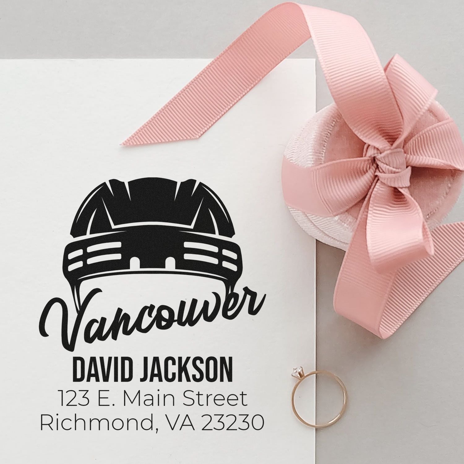 Custom return address rubber stamp for David Jackson, Vancouver, with helmet logo for personalized stationery and mailing.