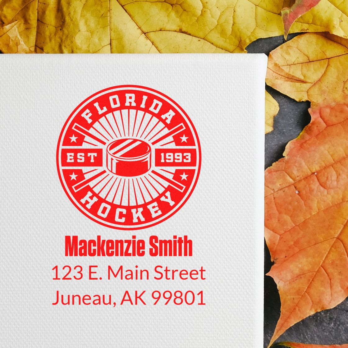 Custom rubber stamp imprint with Florida Hockey logo, Mackenzie Smith name, and Juneau, AK address on paper.