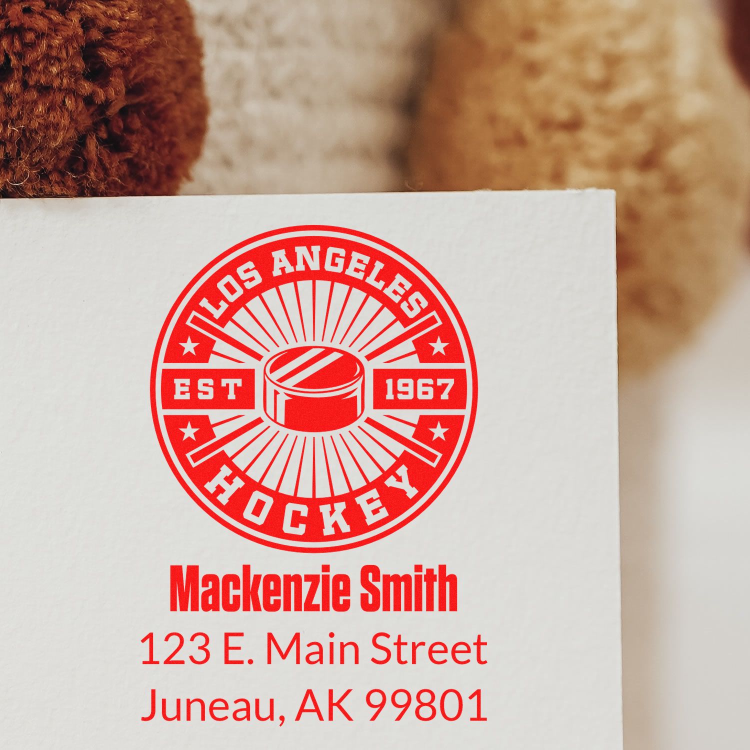 Custom Los Angeles Hockey rubber stamp with MacKenzie Smith name and Juneau, AK address for personalized mailings.
