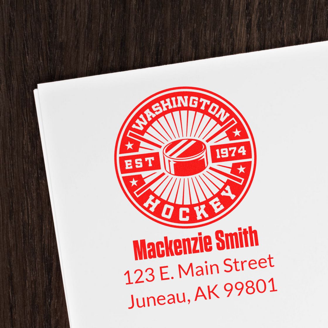 Custom hockey return address rubber stamp with Washington Hockey logo, name, and mailing address.