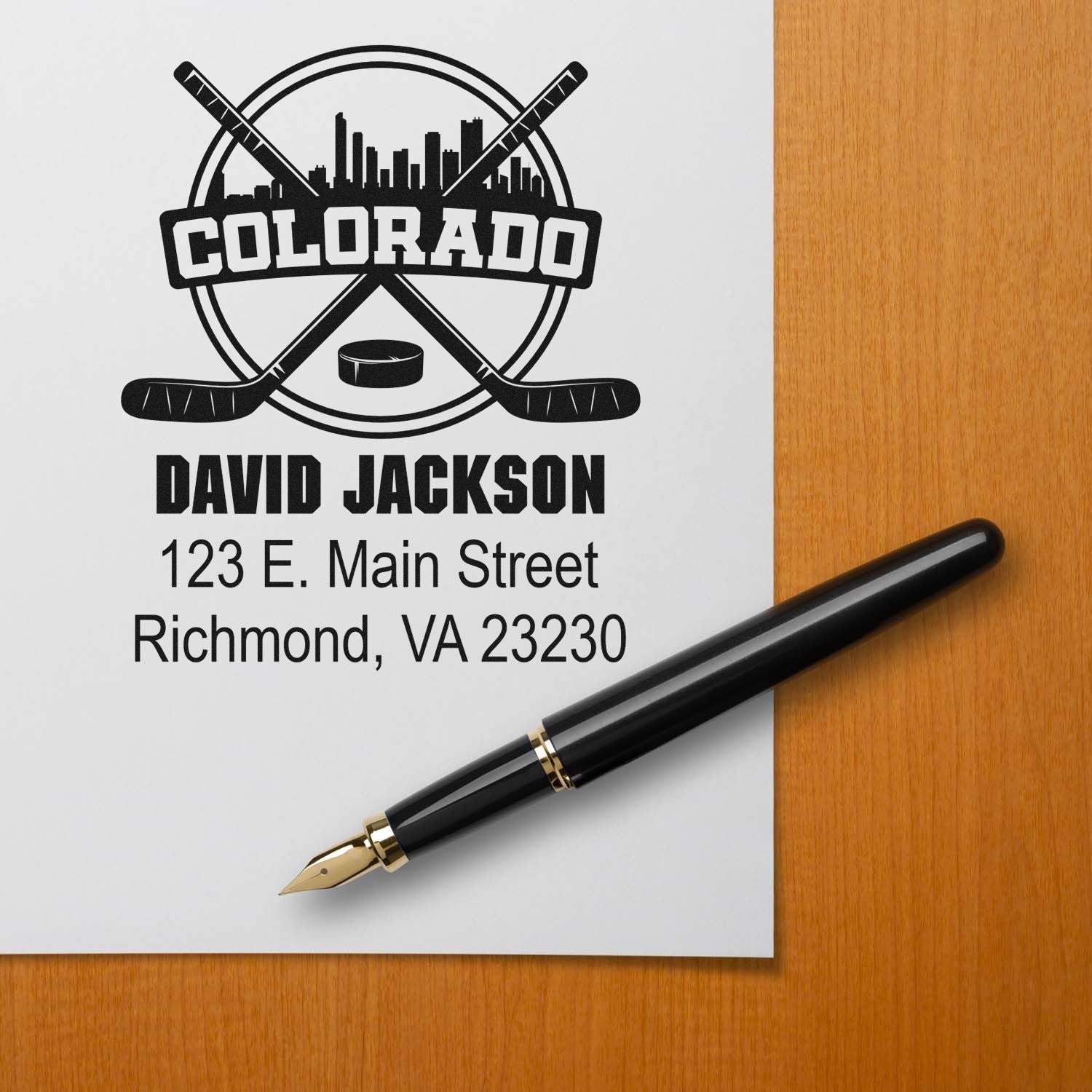 Custom Colorado hockey rubber stamp with name, address, and hockey logo for David Jackson stationery.