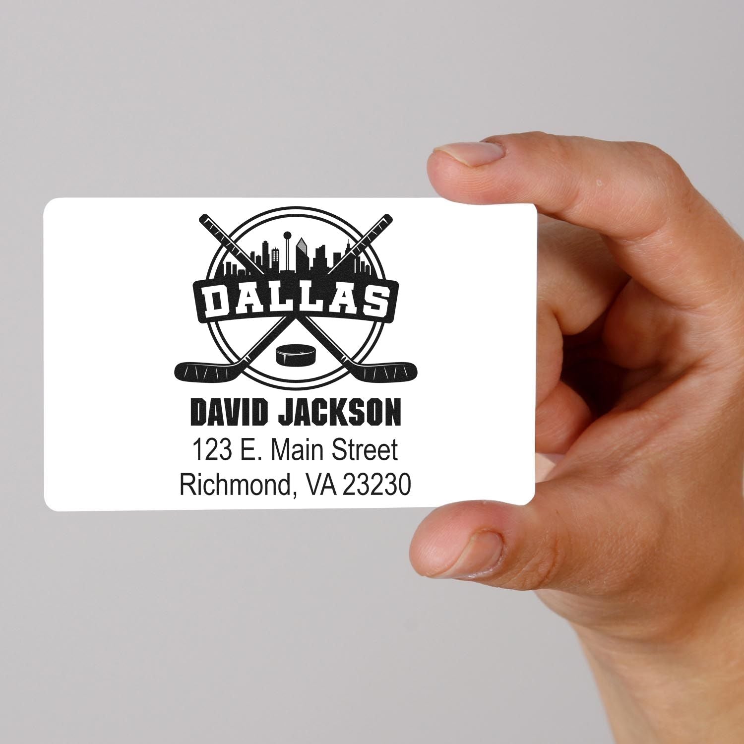 Custom hockey rubber stamp design with Dallas logo, David Jackson name, and Richmond, VA address for business branding.