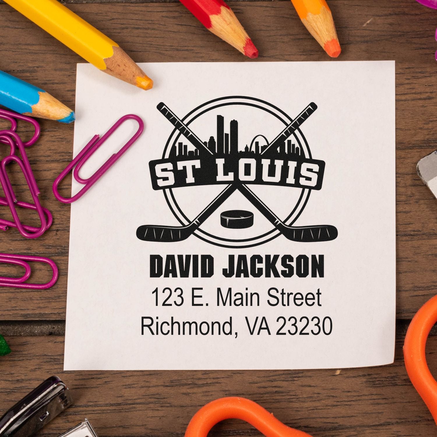 Custom hockey address rubber stamp for St. Louis, featuring personalized name and mailing address.