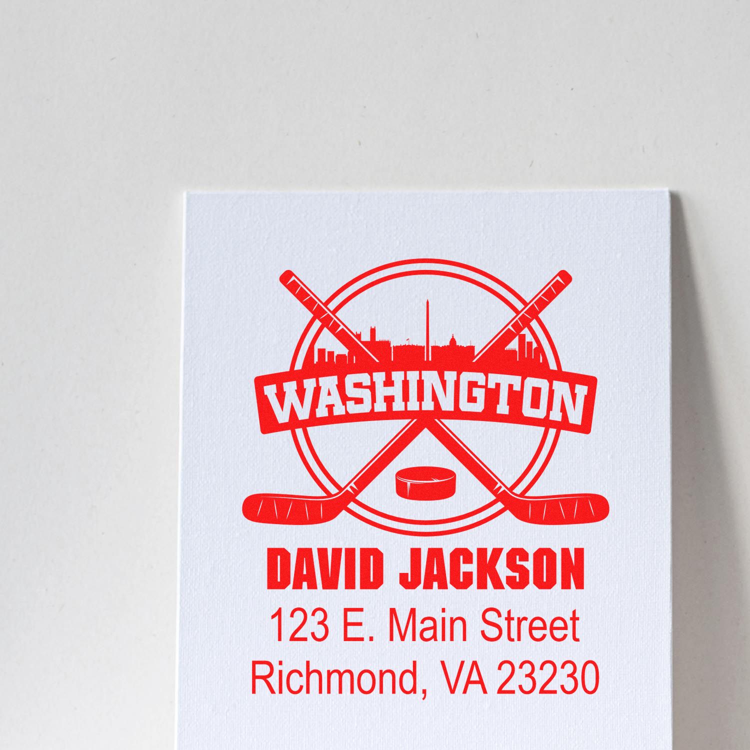 Custom Washington hockey rubber stamp with crossed sticks, player name David Jackson, and Richmond, VA return address.