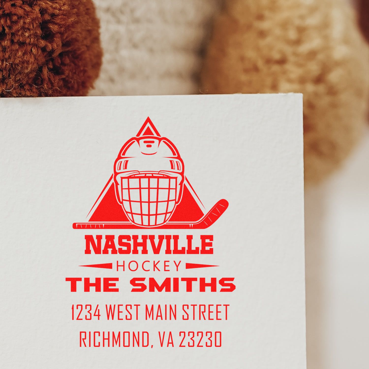 Custom rubber stamp for Nashville hockey, featuring team logo, name, and personalized return address.