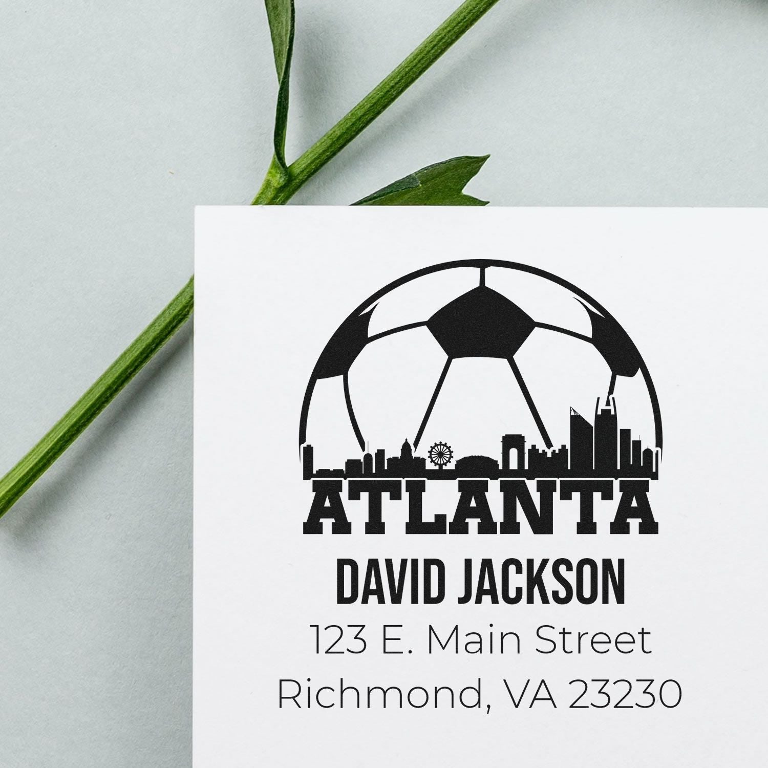 Custom Atlanta rubber address stamp with soccer skyline design for David Jackson, 123 E. Main Street, Richmond, VA 23230.