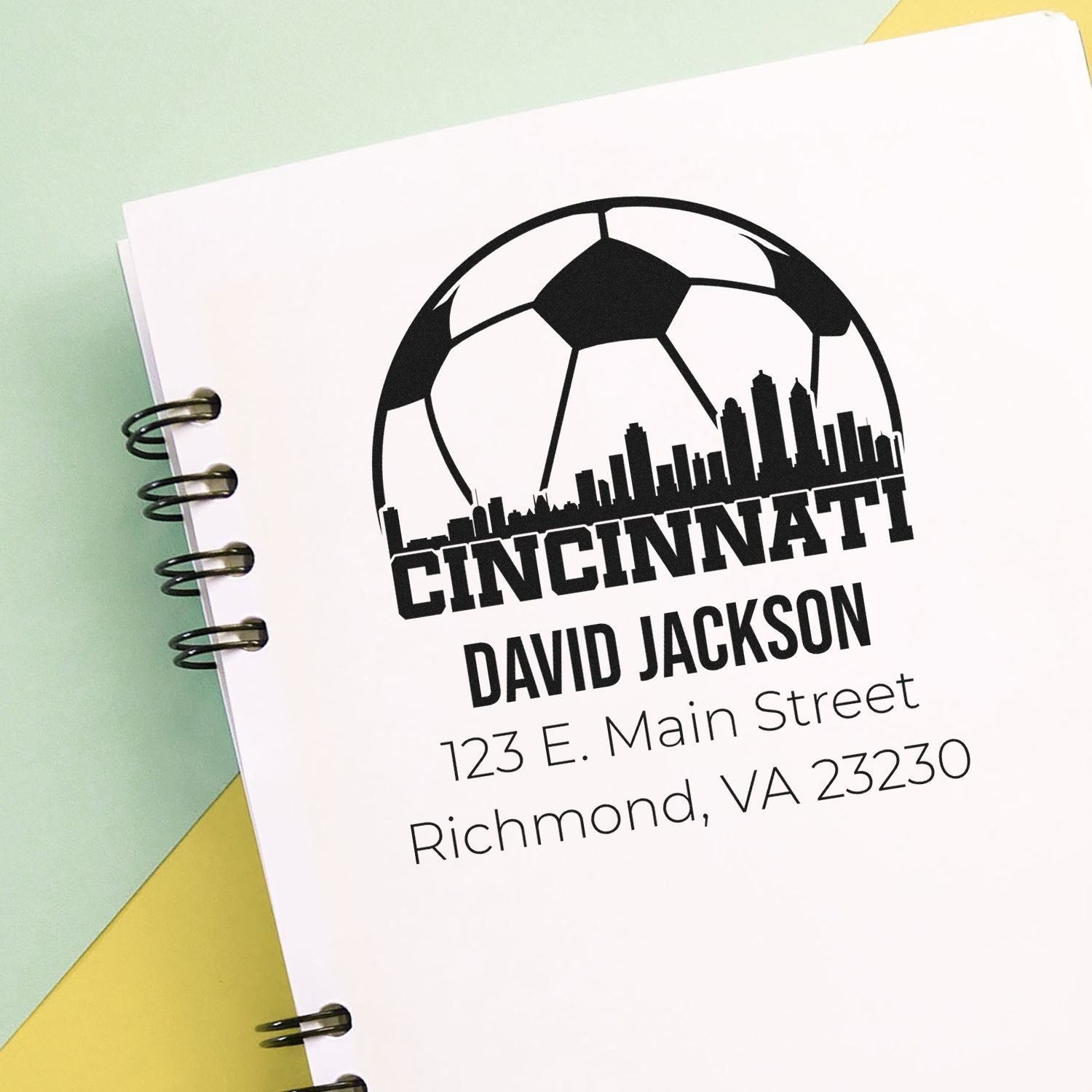 Custom Cincinnati rubber stamp with soccer skyline logo, David Jackson name, and address for business mailings.