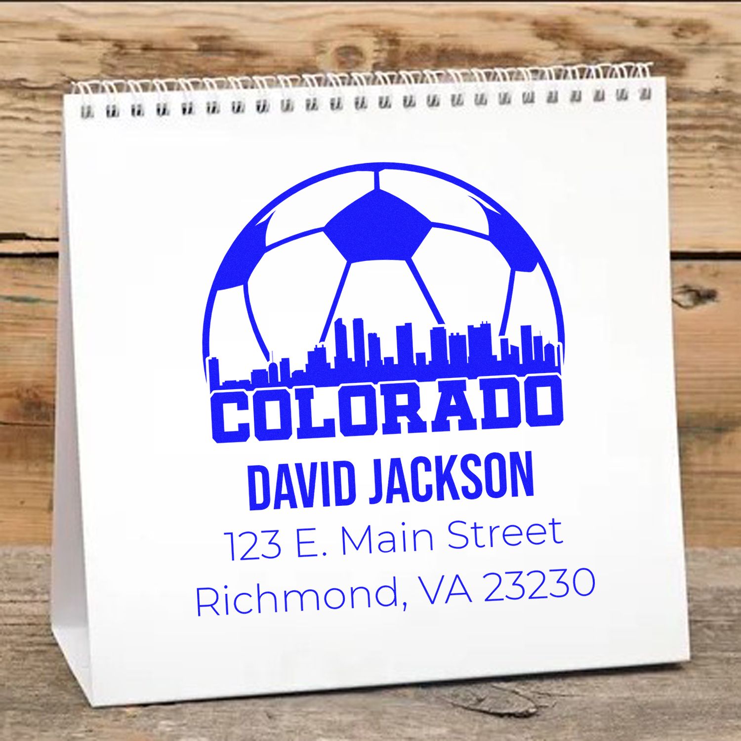 Custom Colorado soccer return address rubber stamp with skyline, name, and address for personalized packaging.