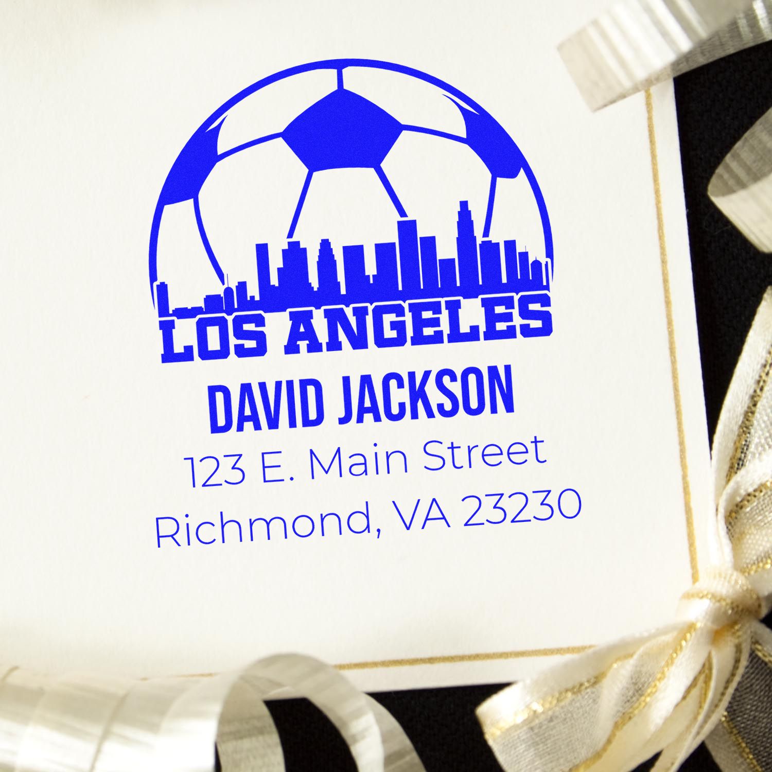 Personalized address rubber stamp with Los Angeles soccer logo, David Jackson, 123 E. Main Street, Richmond, VA 23230.