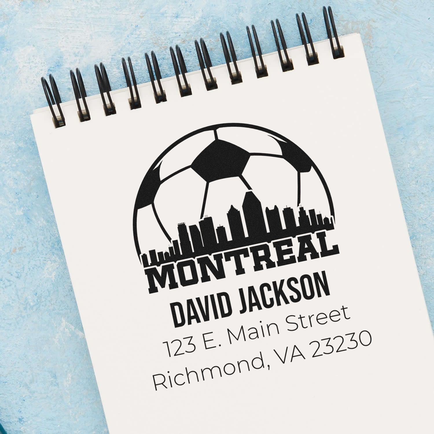Custom Montreal rubber stamp design with soccer ball, city skyline, and personalized David Jackson address details.